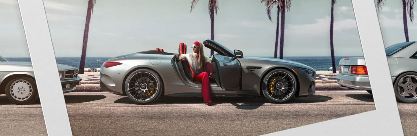 a woman getting out of a 2025 Mercedes-AMG® SL Roadster