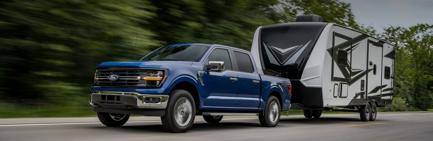 front quarter view of the 2025 Ford F-150 towing a trailer