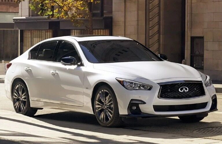 Front passenger angle of a white 2021 INFINITI Q50