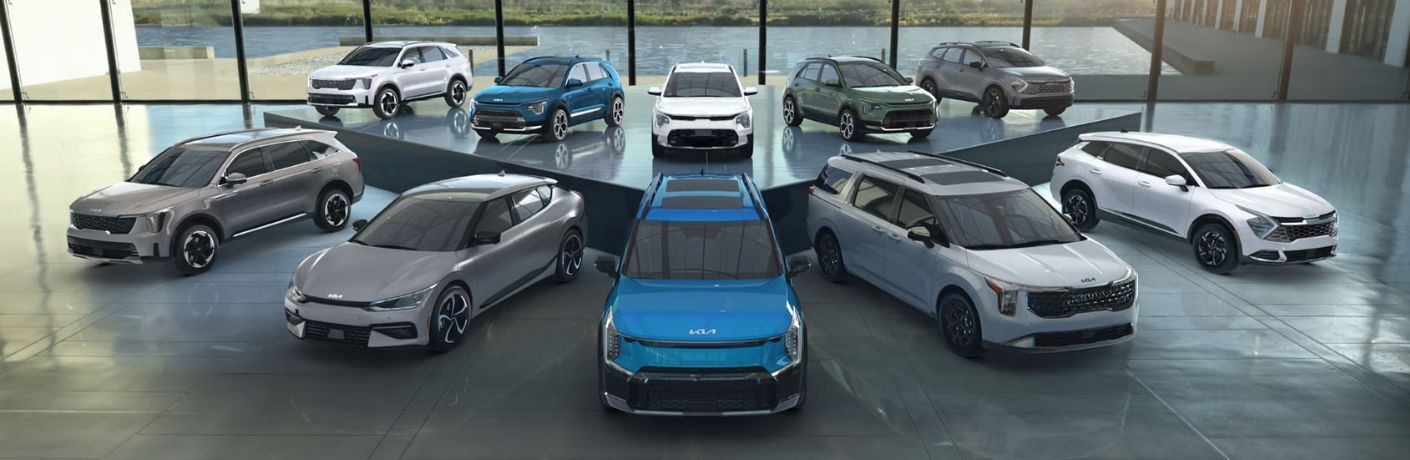 multiple Kia EVs parked in a dealership