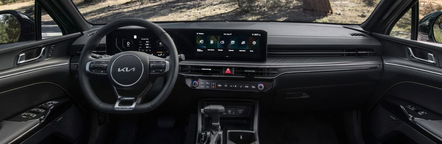 2026 Kia K5 interior view of steering wheel and dashboard