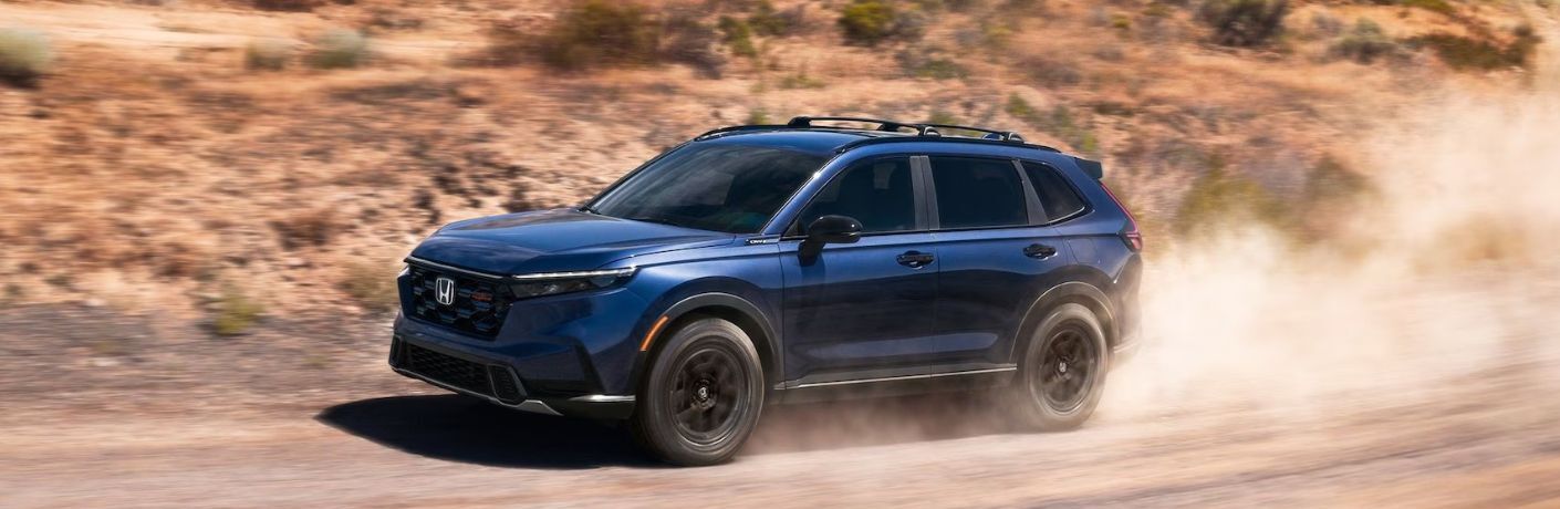 2026 Honda CR-V driving on a dirt trail