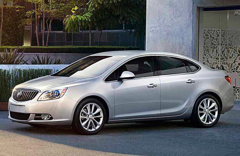 Buick parked in front of building
