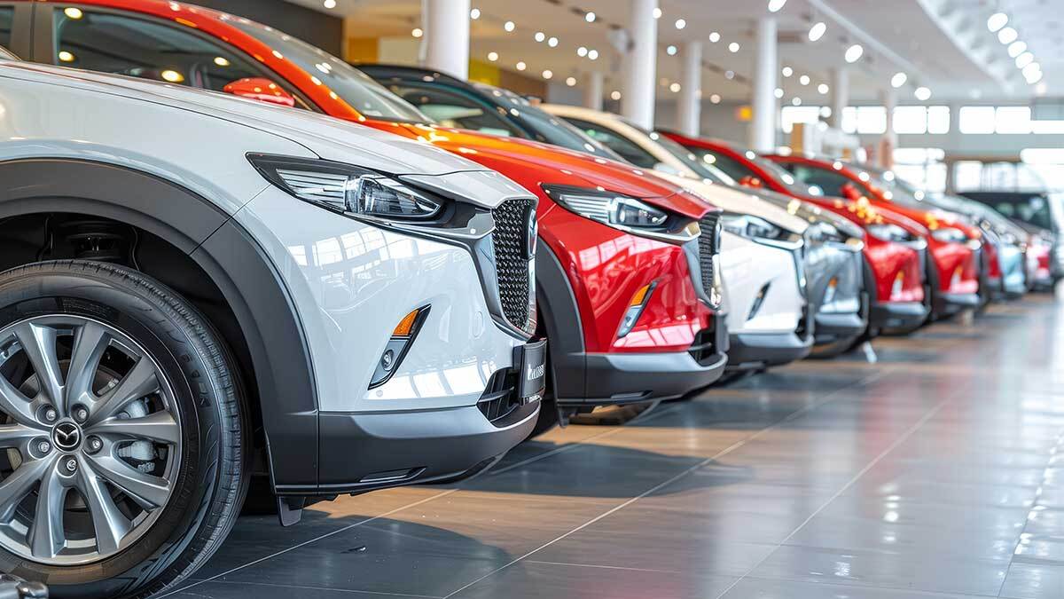 Cars lined up inside dealership