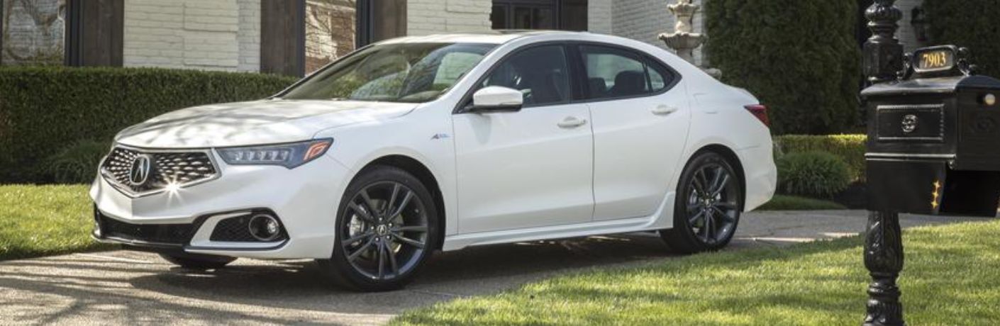 Front three-quarter view of the 2018 Acura TLX parked