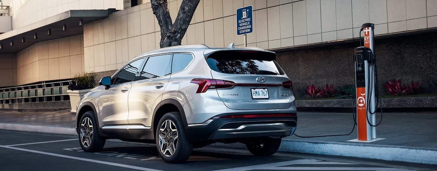 Silver used 2022 Hyundai Santa Fe Hybrid for sale charging