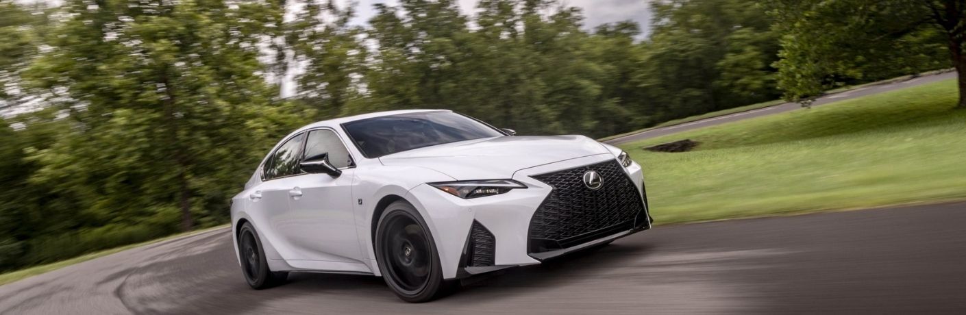 A white 2021 Lexus ES 350 on the road
