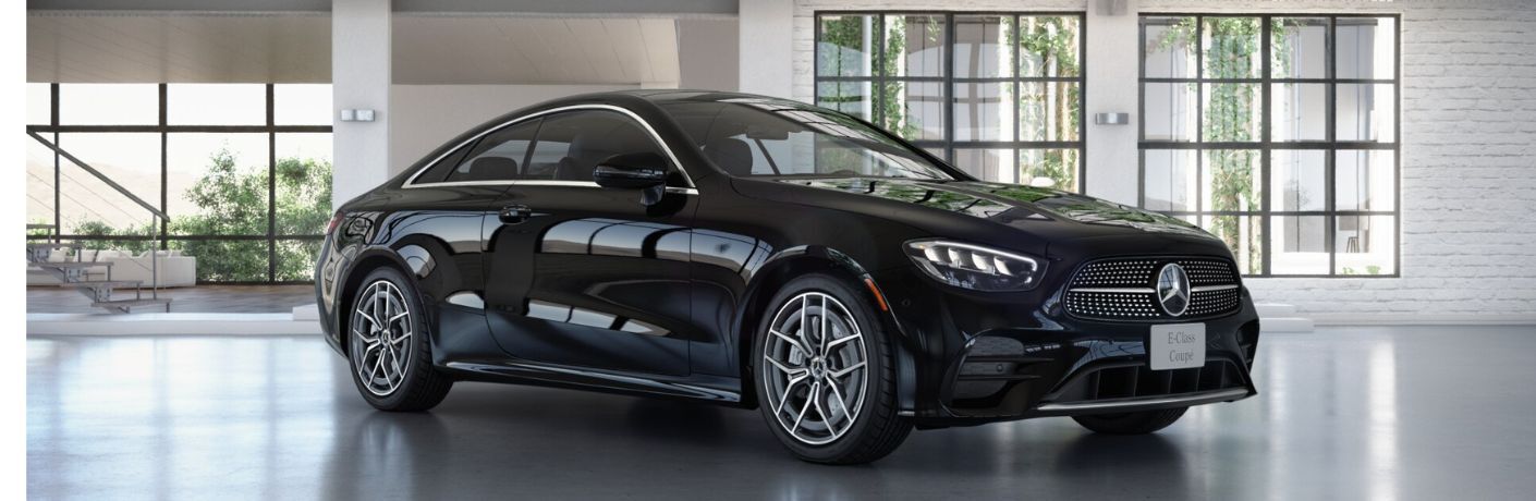 2022 Mercedes-Benz E450 Coupe Black in a showroom