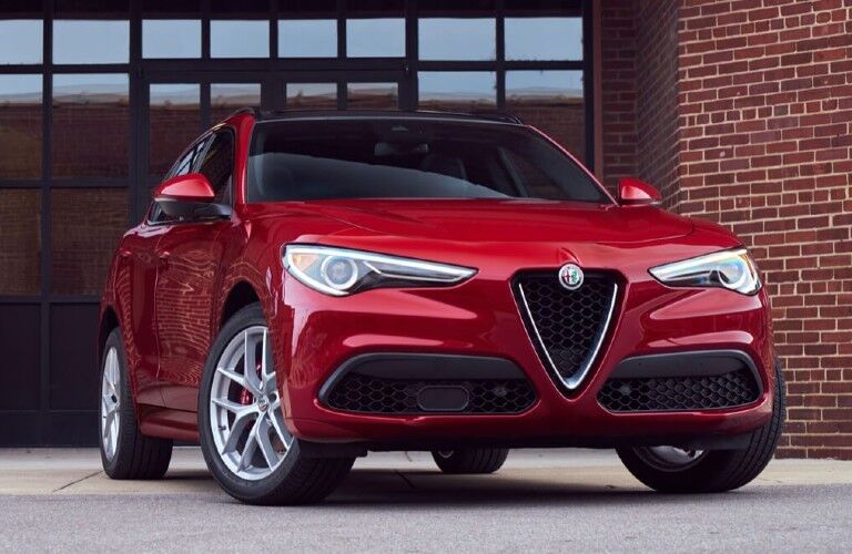 Front passenger angle of a red 2020 Alfa Romeo Stelvio