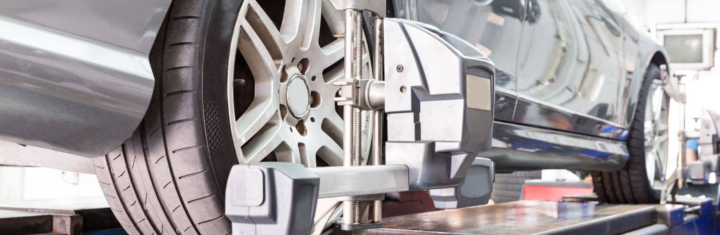 image of a car's wheels being balanced