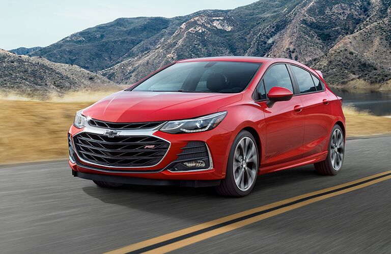 front and side view of red 2019 chevy cruze