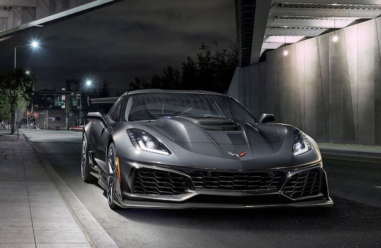 gray 2019 chevrolet corvette driving on city road