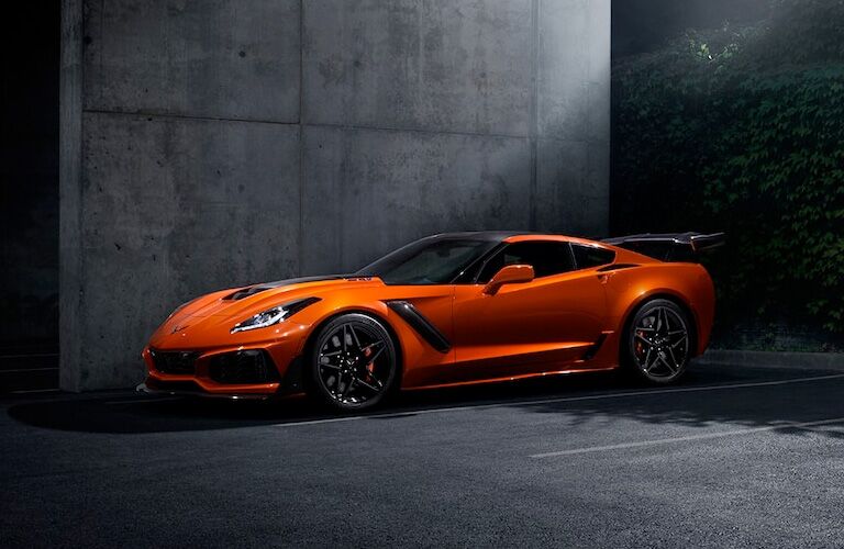 orange 2019 chevrolet corvette in parking space
