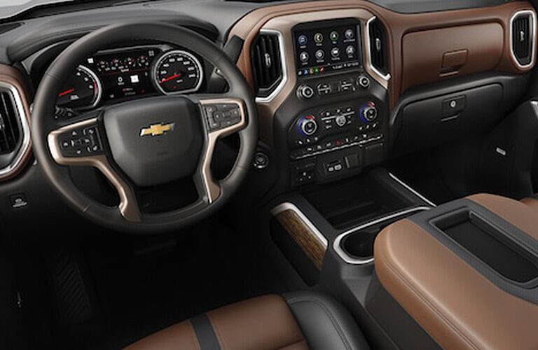 front interior of 2019 chevrolet silverado 1500 including steering wheel and infotainment system