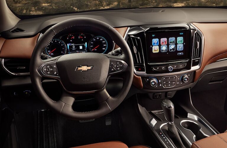 front interior of 2019 chevrolet traverse including steering wheel and infotainment system