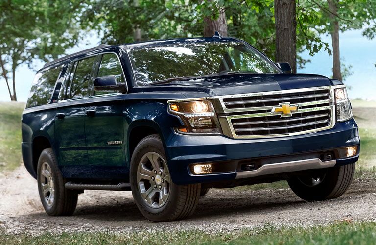 front and side view of blue 2019 chevy suburban