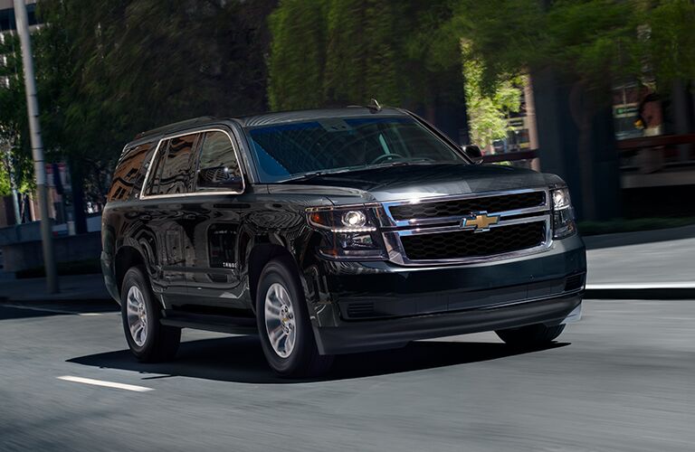 front and side view of black 2019 chevrolet tahoe