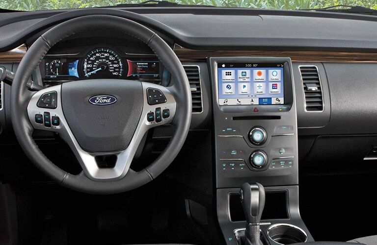 front interior of 2019 ford flex including steering wheel and infotainment system