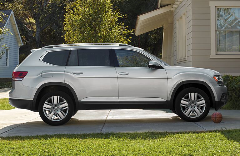 side view of silver 2019 volkswagen atlas