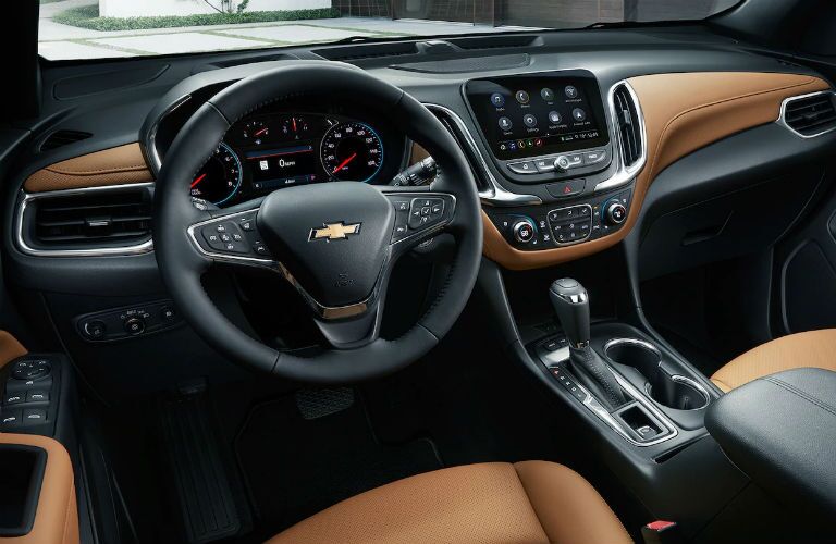 front interior of 2019 chevy equinox including steering wheel and infotainment system