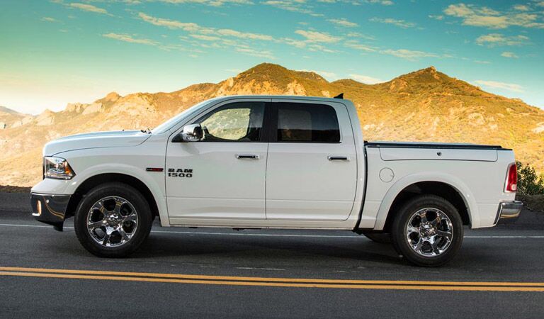 white 2018 Ram driving down the highway