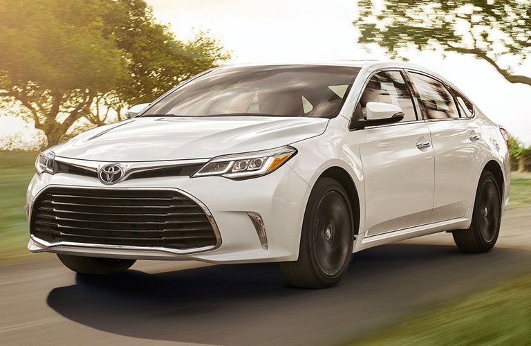 Toyota Avalon driving on a road