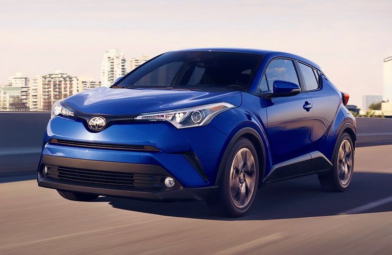 Toyota C-HR driving on a city road