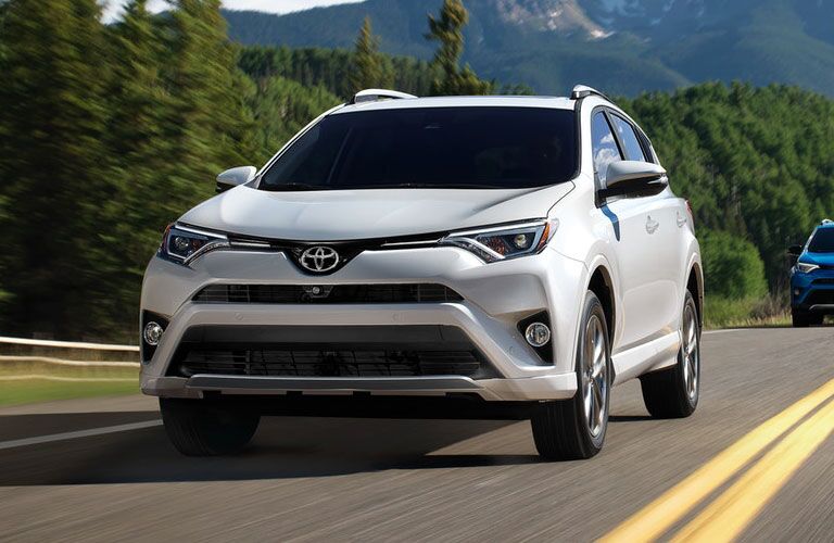 Toyota RAV4 driving on a country road