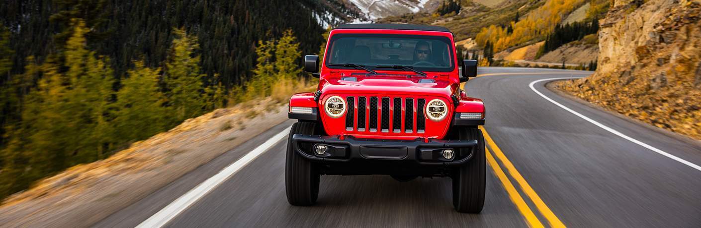 2018 Jeep Wrangler JL driving down a road