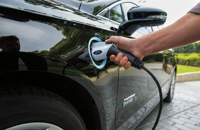 A close up photo of the plug-in charging system for the 2018 Ford Fusion Energi
