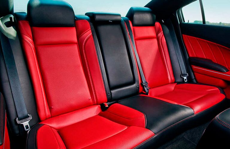 2017 Dodge Charger with two tone red and black seats