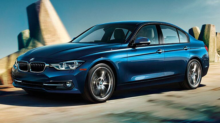 partial profile of a blue 2016 BMW 3 Series