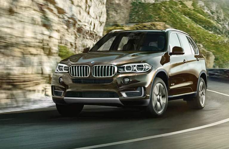 2018 BMW X5 driving on a curvy road