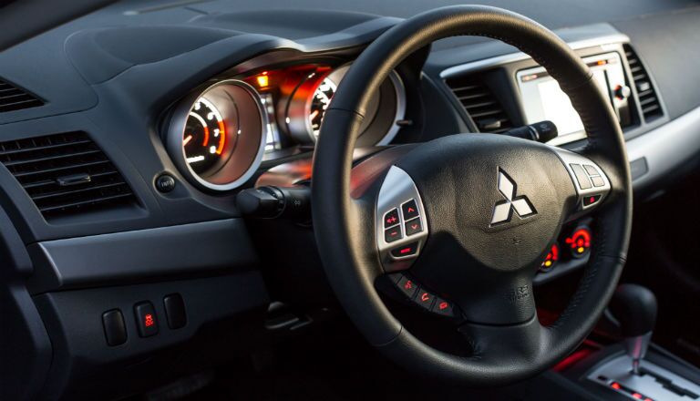 2015 Mitsubishi Lancer vs. 2015 Subaru WRX STI