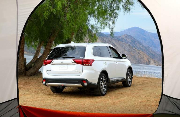 2018 Mitsubishi Outlander parked by a lake