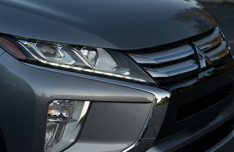 front end of silver 2019 mitsubishi eclipse cross including grille and headlamps