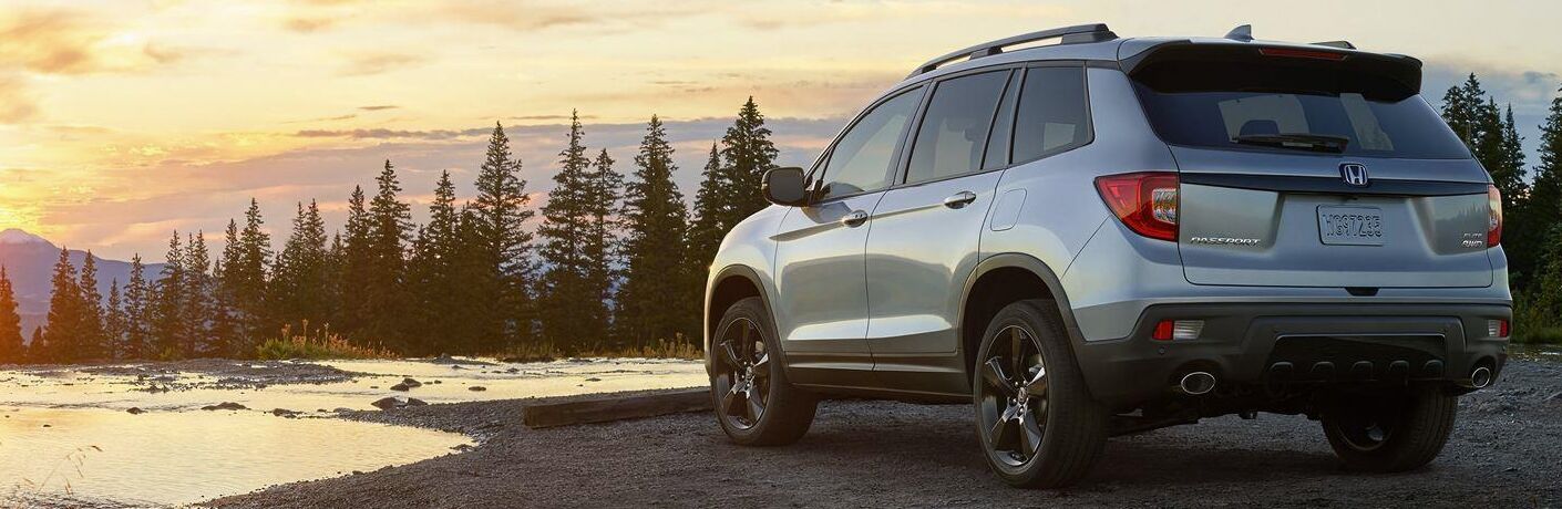 2019 Honda Passport offroad overlooking lake at sunset