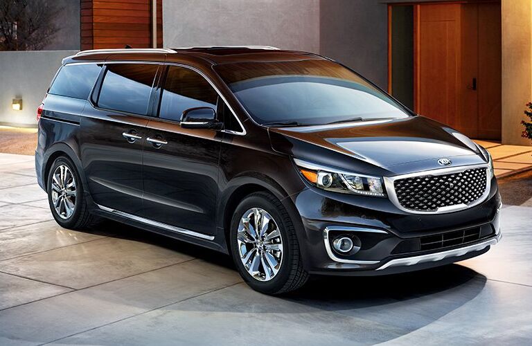 black Kia Sedona parked