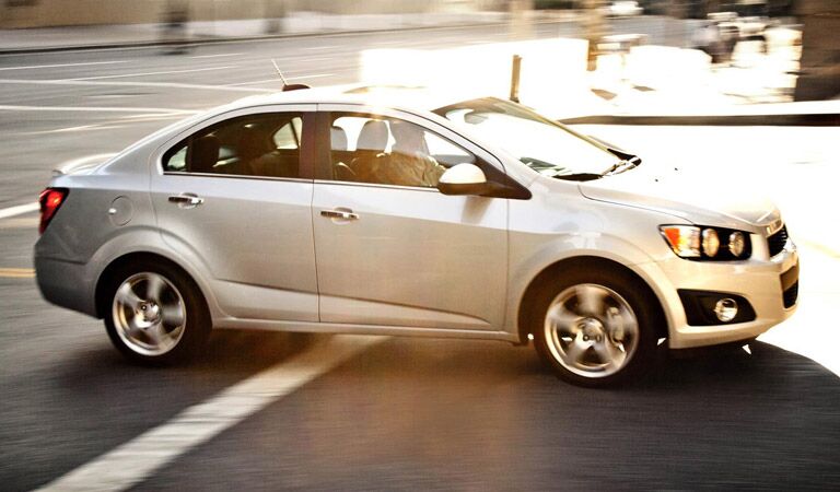 White Chevy Sonic in the city