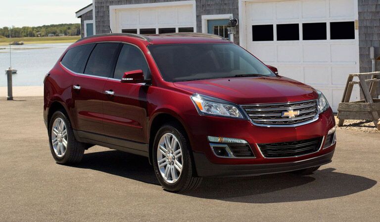Red Chevy Traverse by the water