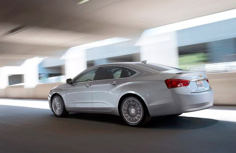 pale 2017 Chevy Impala driving fast on the road Winnipeg, MB