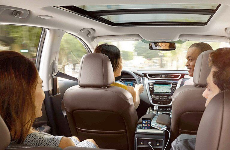 family chatting inside 2017 Nissan Murano