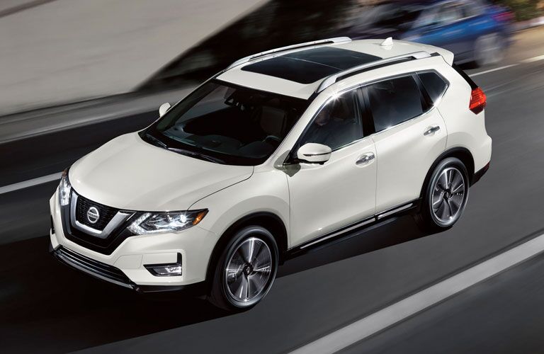 2020 Nissan Rogue going down the road