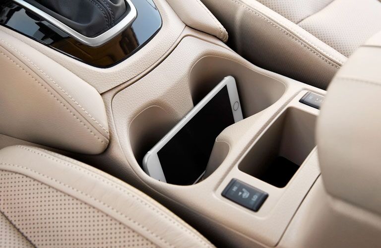 Phone inside of cup holders in the 2020 Nissan Rogue
