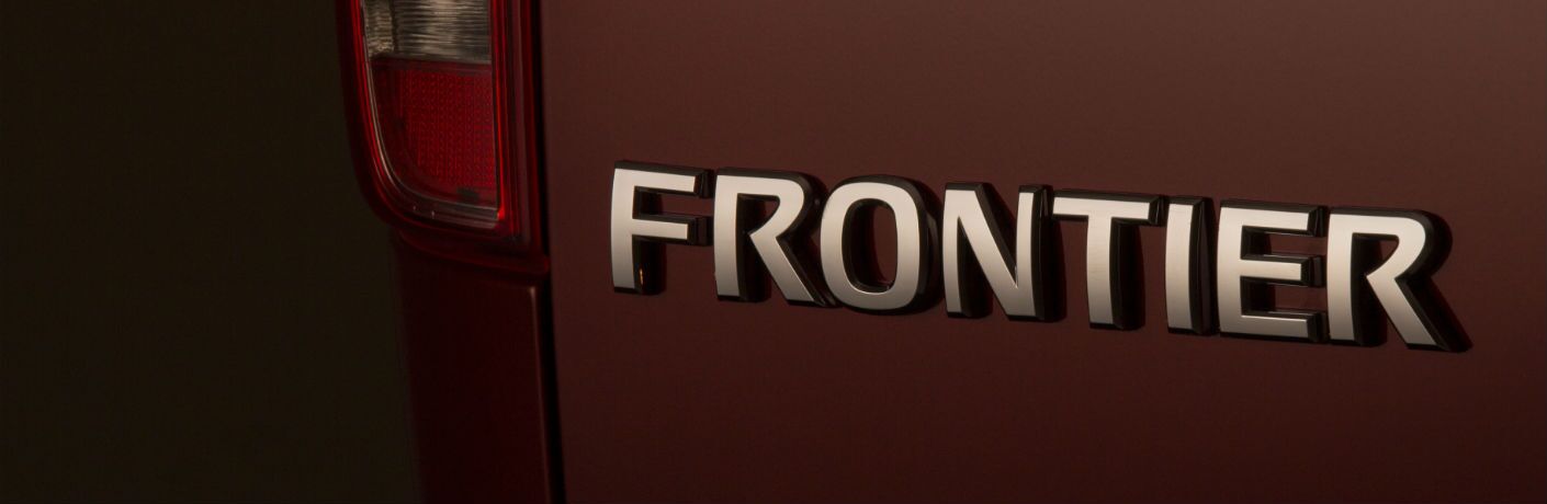 A photo of the Frontier badge used on the 2020 Nissan Frontier.