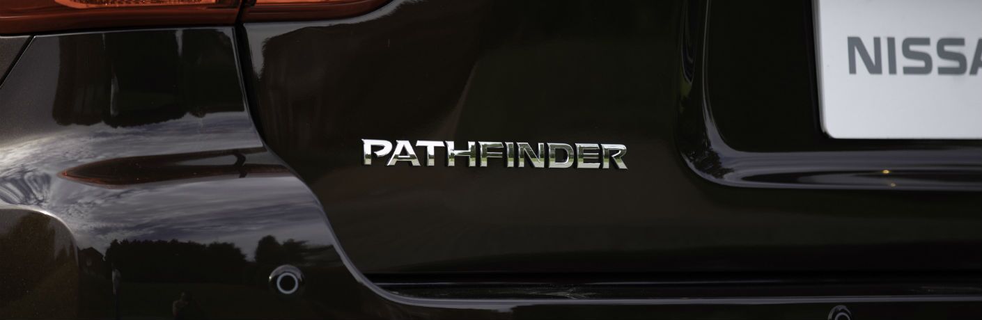 A close up photo of the Pathfinder badge used by the 2019 Nissan Pathfinder.