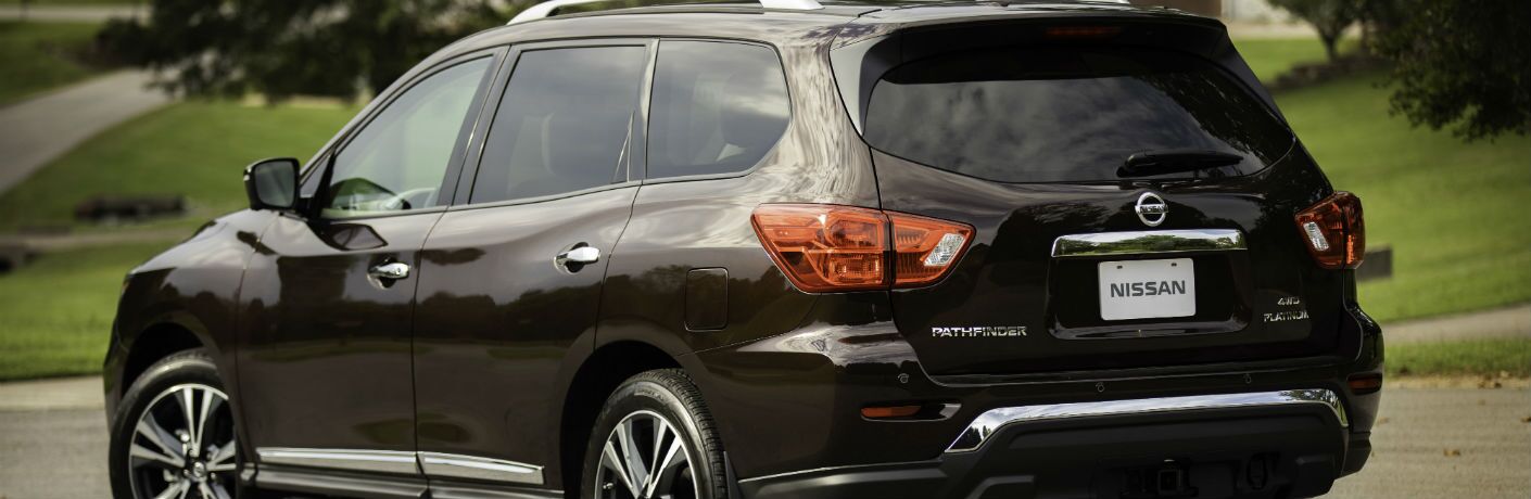 A rear left quarter photo of the 2019 Nissan Pathfinder.