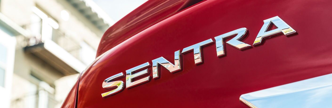 A close up photo of the Sentra badge on the back of the 2019 Nissan Sentra coming to JC Billion Nissan.