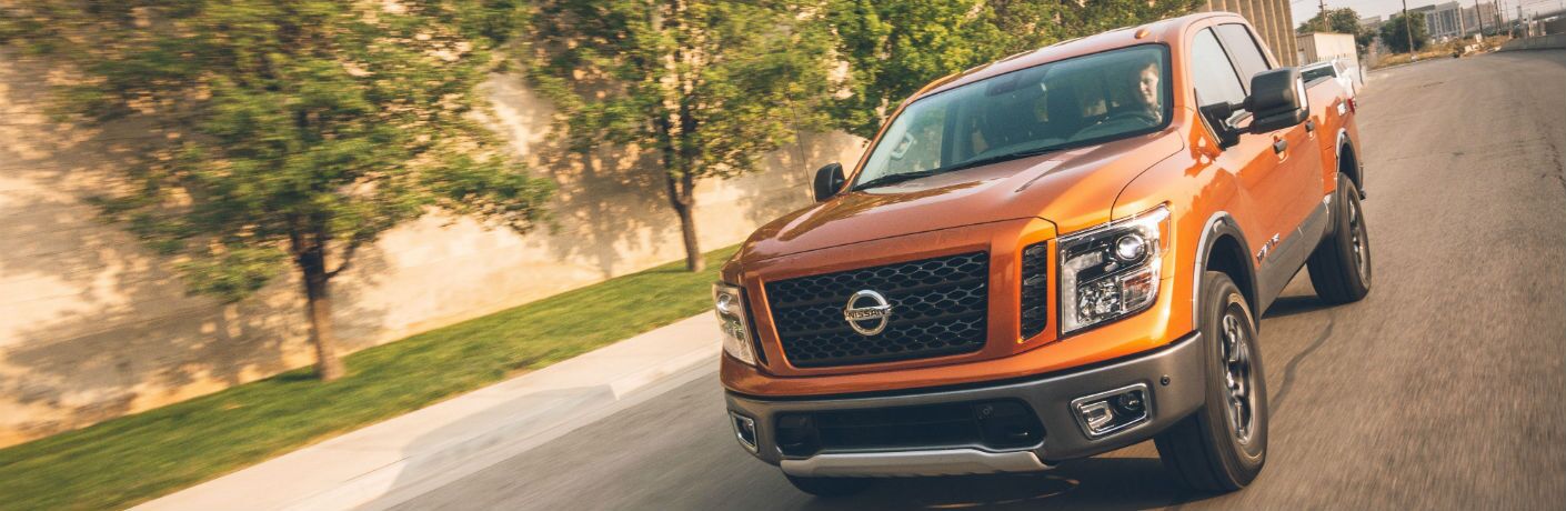 A head-on photo of the 2019 Nissan Titan on the road.