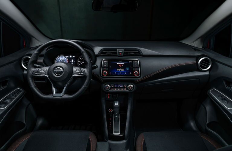 A photo of the driver's cockpit and the dashboard in the 2021 Nissan Versa.